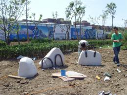 hj1736 石雕—箱包_青島國際服裝城不銹鋼雕塑、石雕、玻璃鋼雕塑_濱州宏景雕塑有限公司